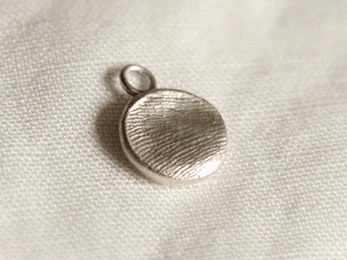 Pendentif argent empreinte doigt