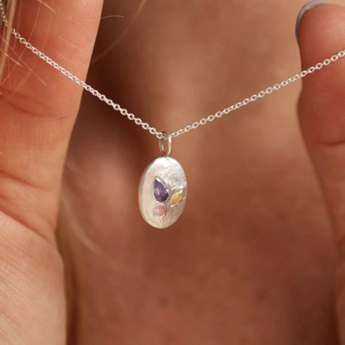 Pendentif avec zircons colorés