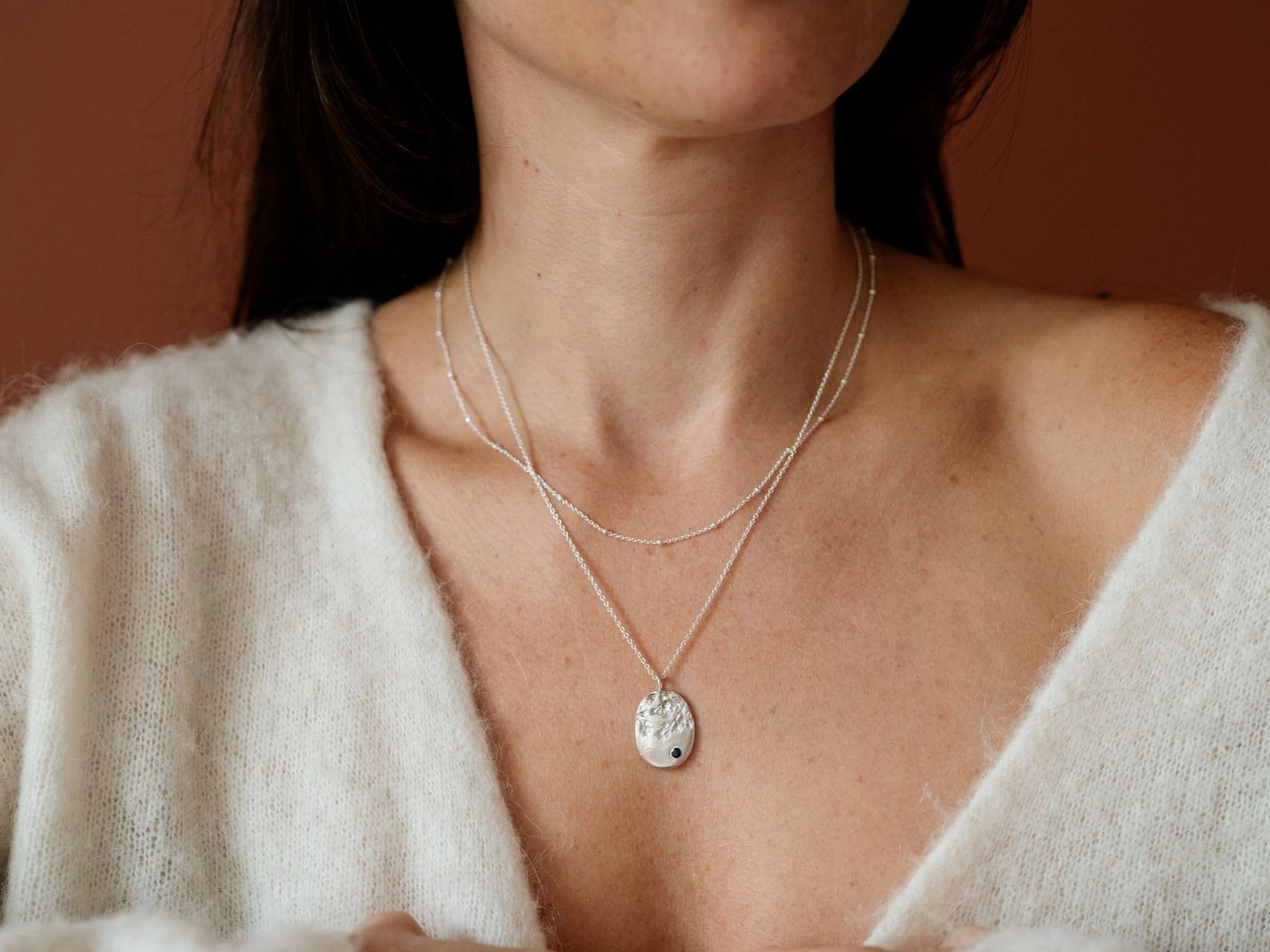 Pendentif pate d'argent empreinte fleur